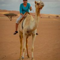 Riding a Camel in Wahiba Sands Oman